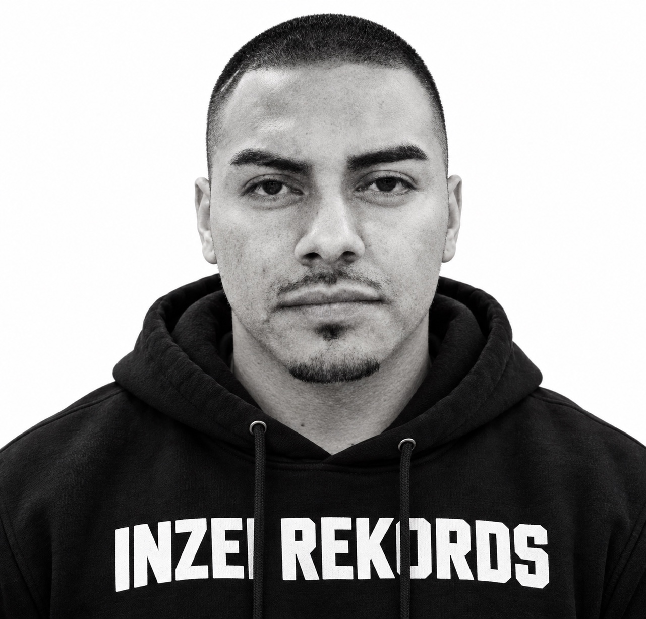 David Mr. Westcoast in a black-and-white headshot wearing an Inzei Rekords hoodie