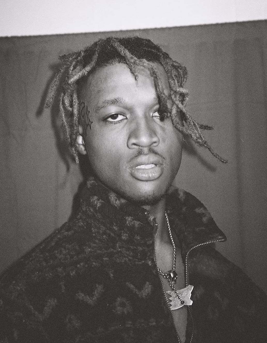 The Paramaxx in a black-and-white portrait